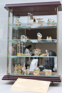 A Small Display Cabinet Containing A Collection Of Brooks Bentley regarding dimensions 1000 X 1500