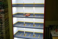 Creative Model Car Display Cabinet Looks Like Lighted Parking Garage inside proportions 1152 X 2048