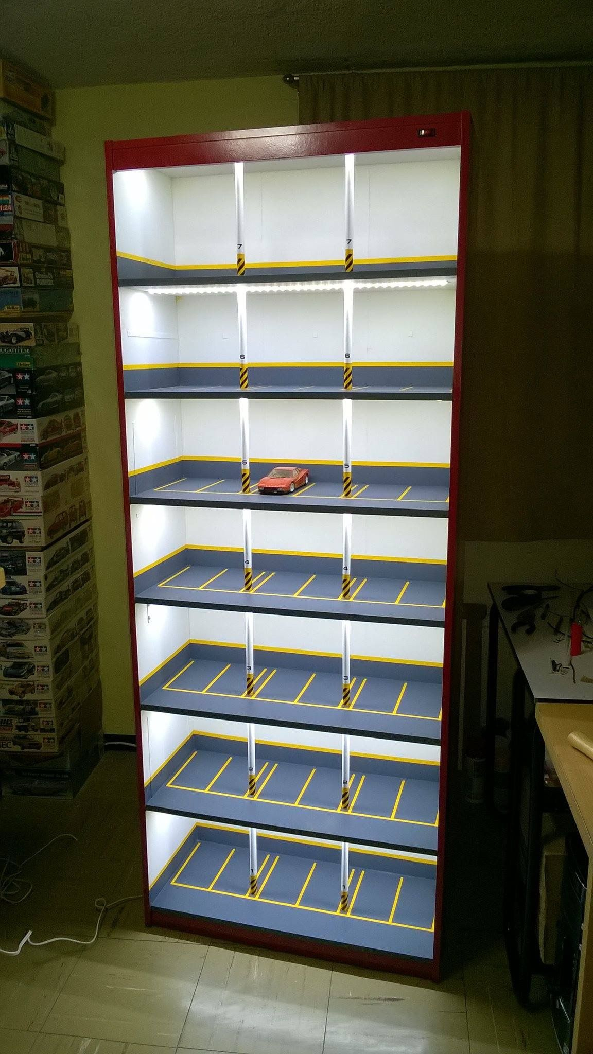 Creative Model Car Display Cabinet Looks Like Lighted Parking Garage with regard to dimensions 1152 X 2048