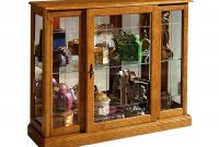 The Best Console Curio Cabinet In Golden Oak Iii Pulaski Home pertaining to proportions 1957 X 2000