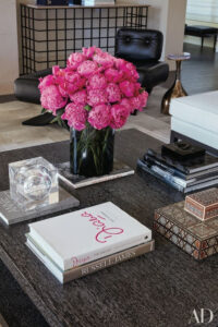 Hot Pink Floral Arrangement Takes Center Stage On This Coffee Table inside sizing 750 X 1124