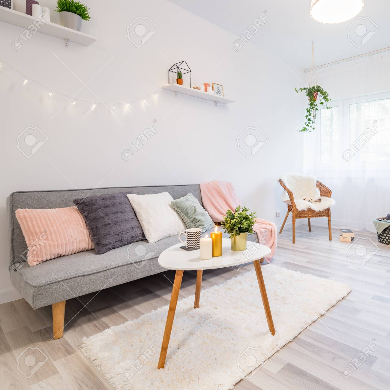 Sofa With Pillows Coffee Table And Rug In Scandi Living Room Stock pertaining to proportions 1300 X 1300